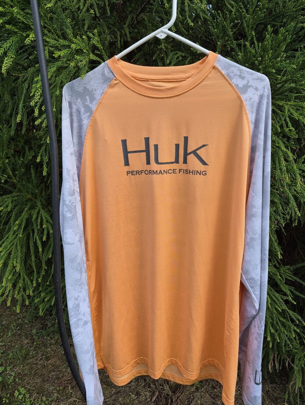 Mens Huk Fishing Long Sleeve Performance Shirt in Orange with Gray Camo Sleeves